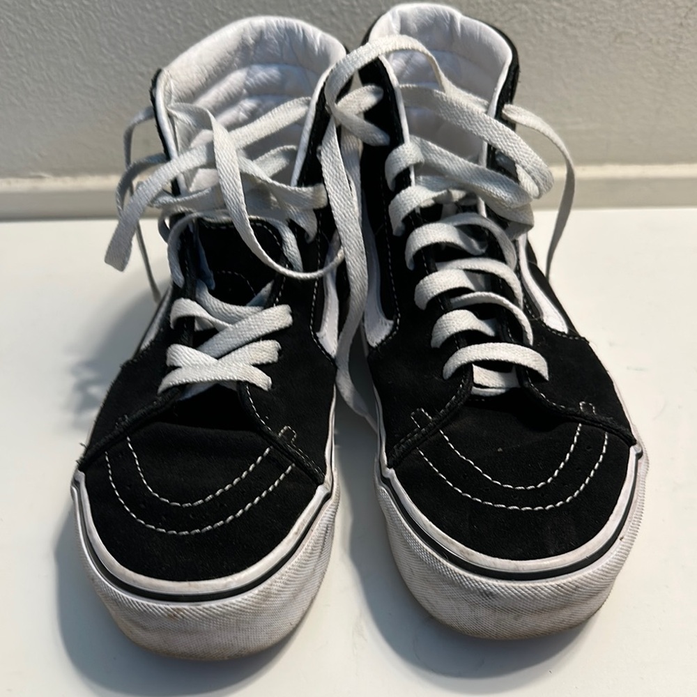 Vans Black and White High-Top Sneakers with Classic Skate Style